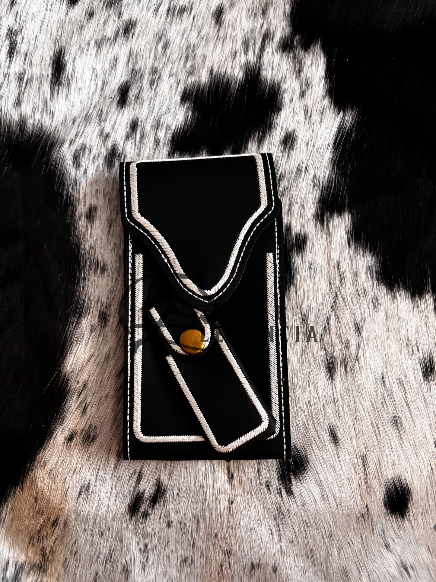 Funda de celular y navajero